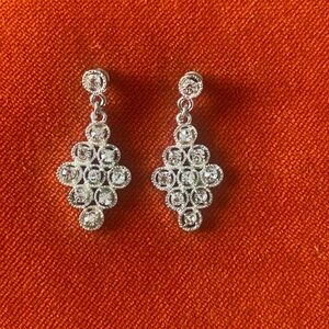beautiful earrings with white zircons